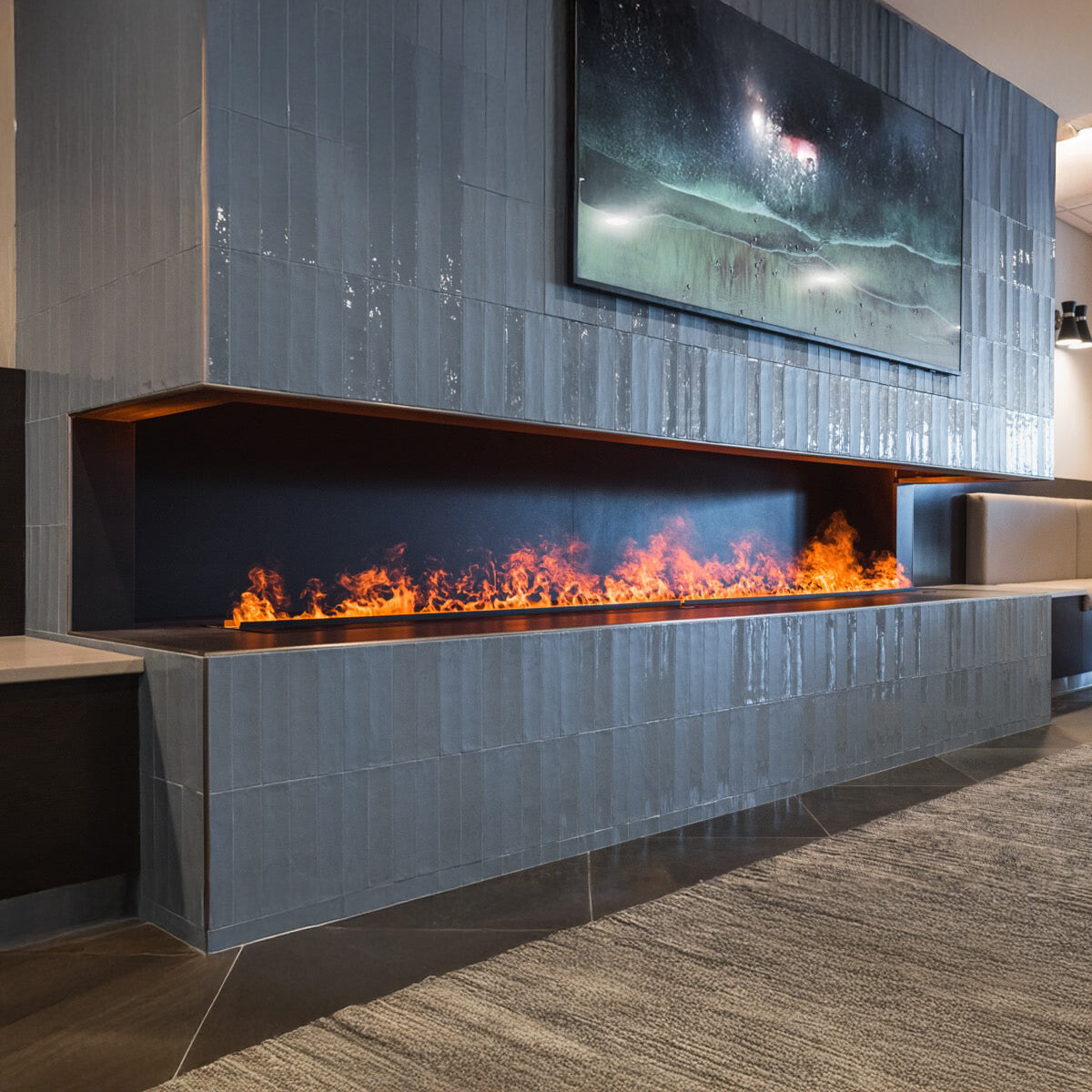 Aqua Fire Lite with natural flames in a tiled surround